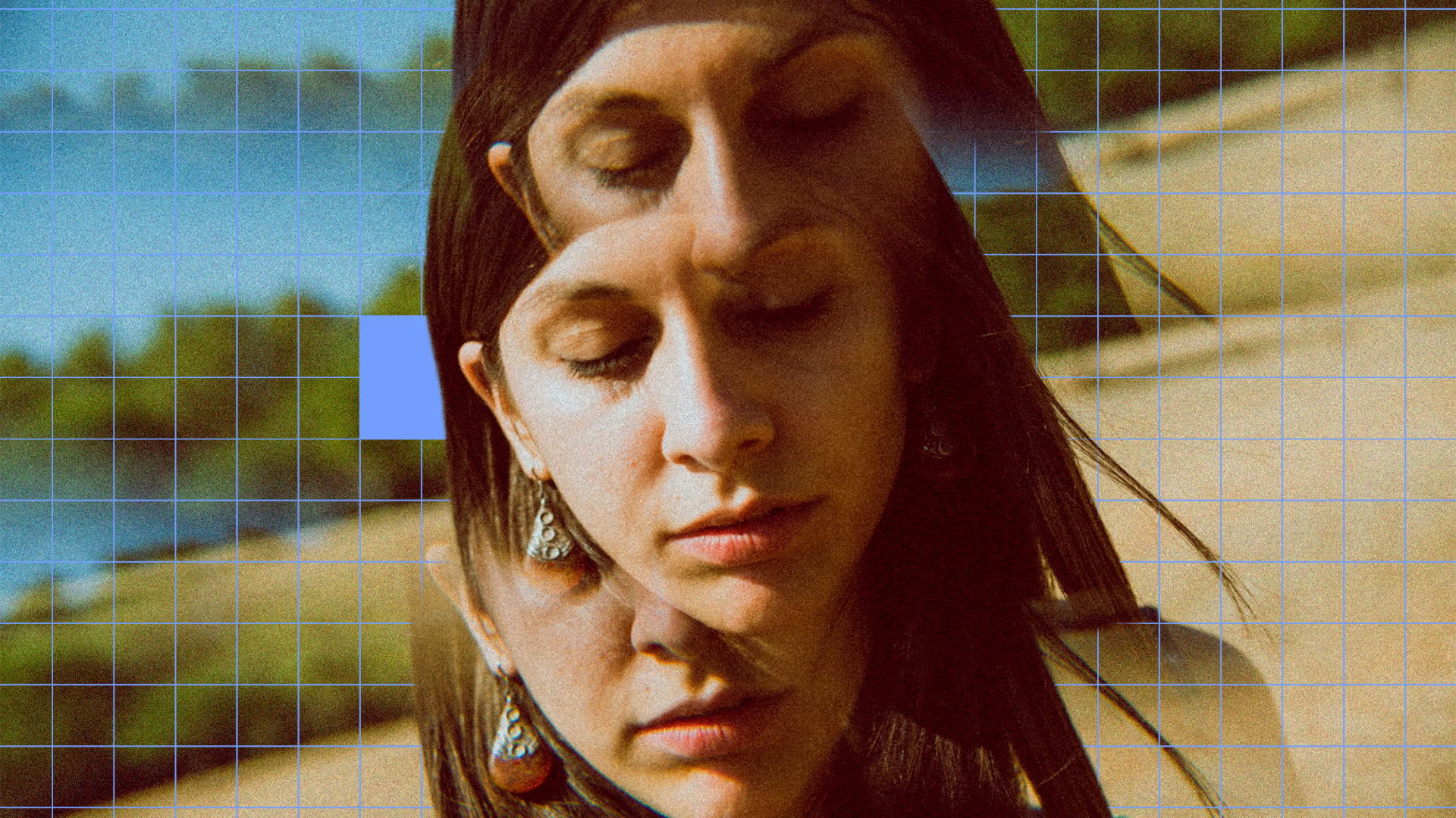 Woman with closed eyes enjoying outdoor sound experience.