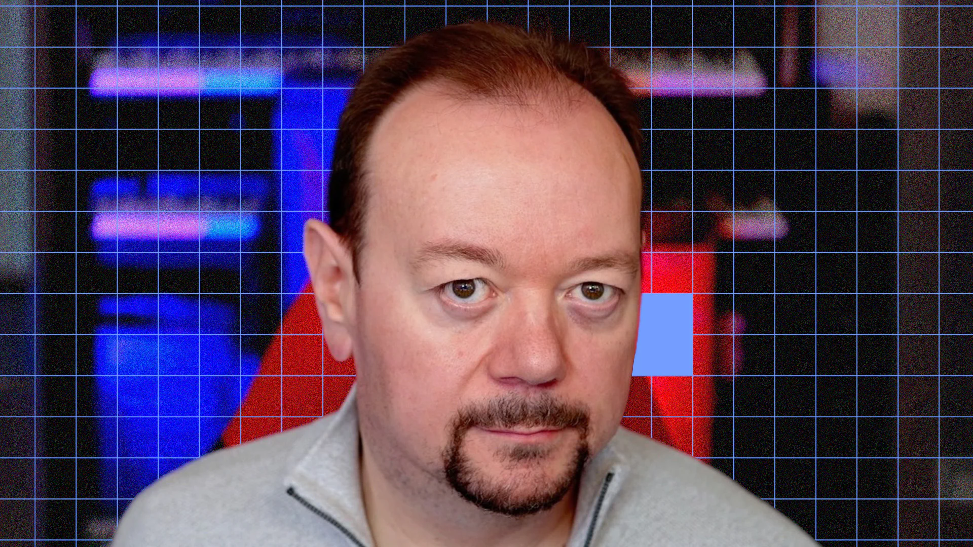 Close-up of a man in front of a digital sound design interface.